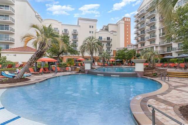 view of swimming pool featuring a patio