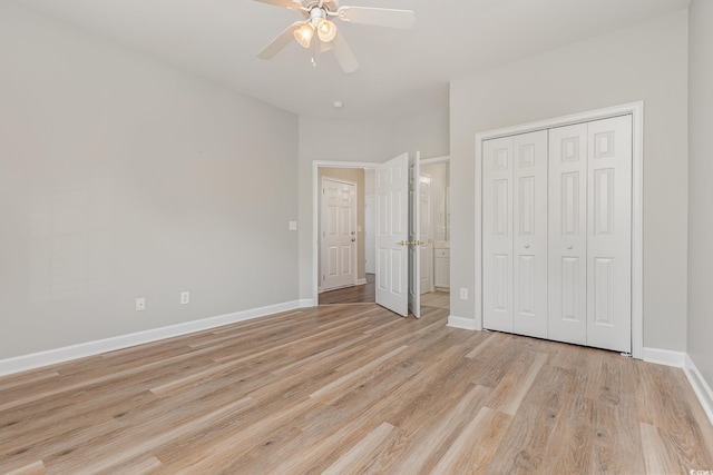 unfurnished bedroom with a closet, ceiling fan, and light hardwood / wood-style floors