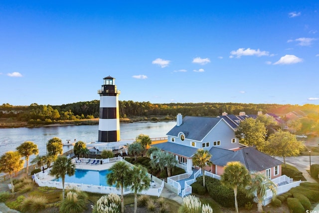 birds eye view of property featuring a water view