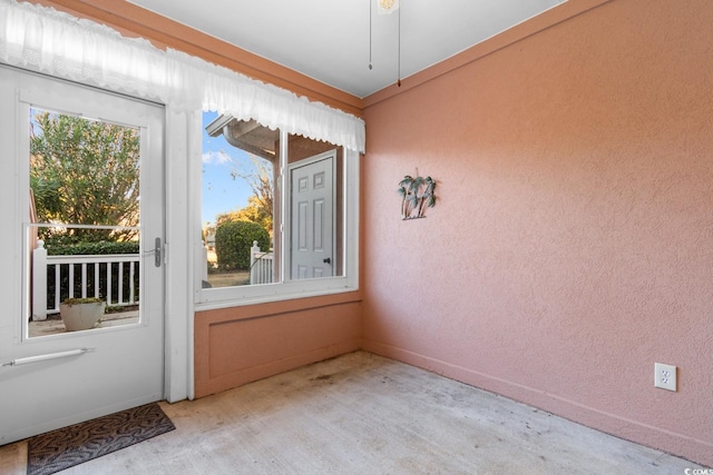 entryway featuring light carpet