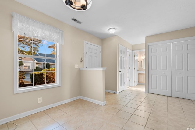 view of tiled spare room