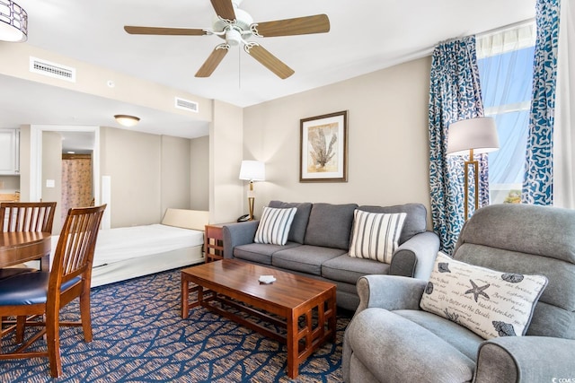 living room with ceiling fan