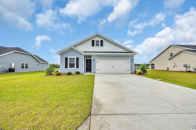 view of front of home with driveway, central air condition unit, a front yard, and an attached garage