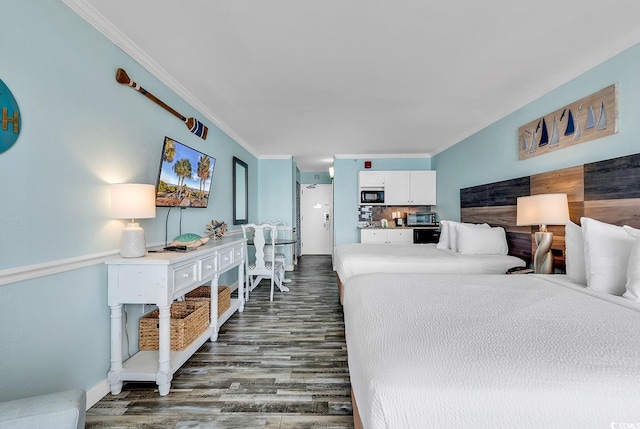 bedroom featuring ornamental molding and dark hardwood / wood-style floors