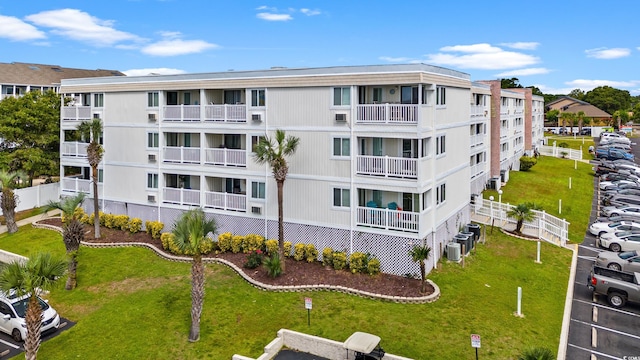 view of property with central AC unit