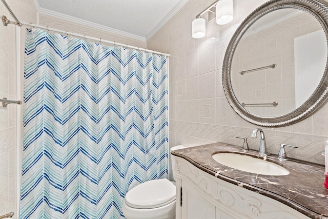 bathroom featuring tile walls, vanity, ornamental molding, a textured ceiling, and toilet