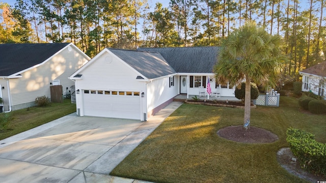 ranch-style home featuring a front lawn and a garage