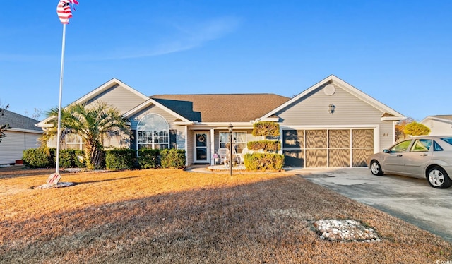 ranch-style house featuring a garage