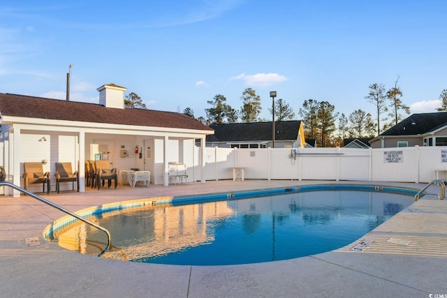 view of pool featuring a patio area