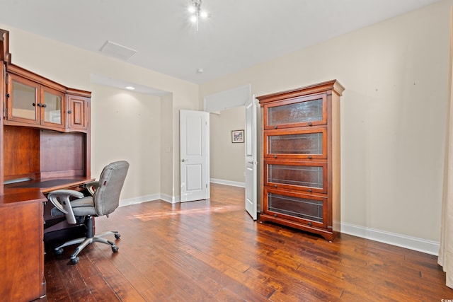 office area featuring dark wood-type flooring