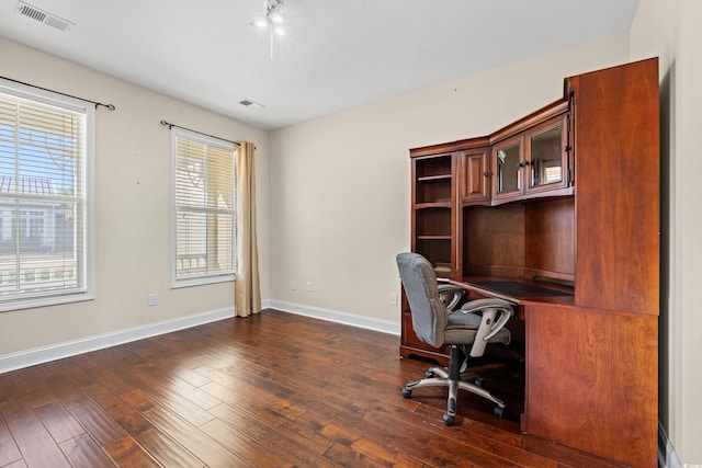 home office featuring dark wood-type flooring