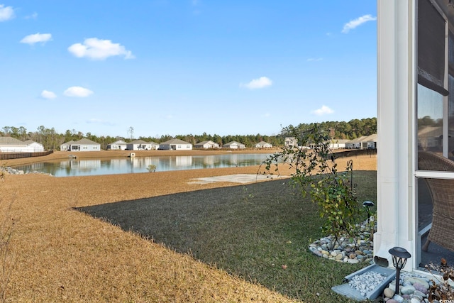 view of yard with a water view