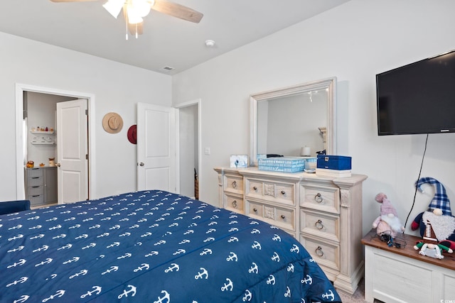 bedroom with ceiling fan and carpet