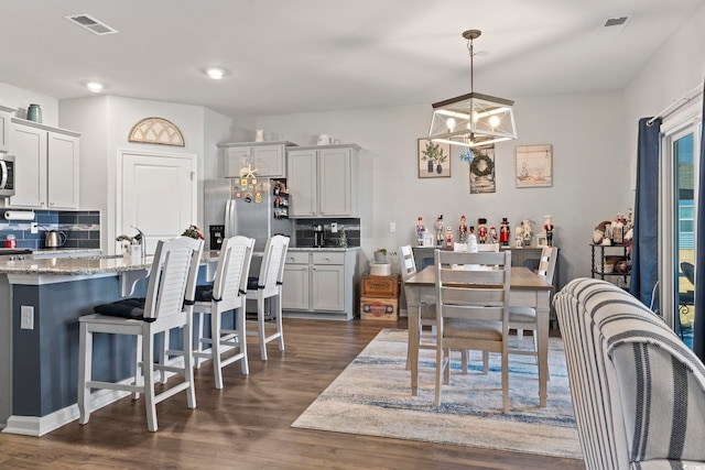 dining room featuring dark hardwood / wood-style floors