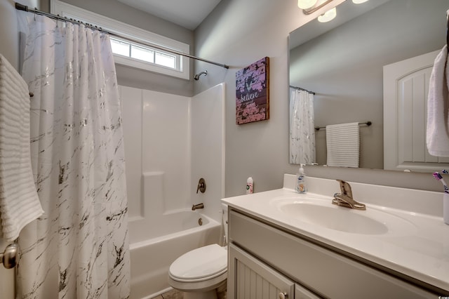 full bathroom featuring shower / bath combo, toilet, and vanity