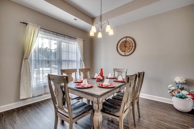 dining space with a chandelier and dark wood-type flooring