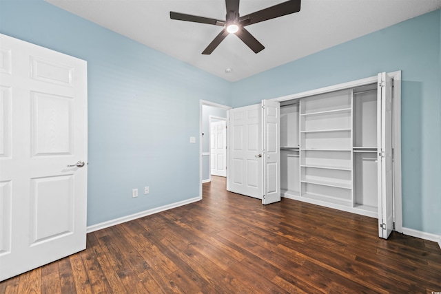 unfurnished bedroom with dark hardwood / wood-style floors and ceiling fan