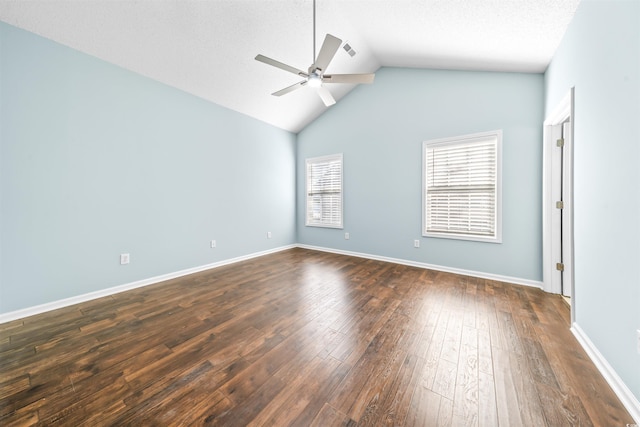 unfurnished room featuring ceiling fan, dark hardwood / wood-style flooring, a textured ceiling, and high vaulted ceiling