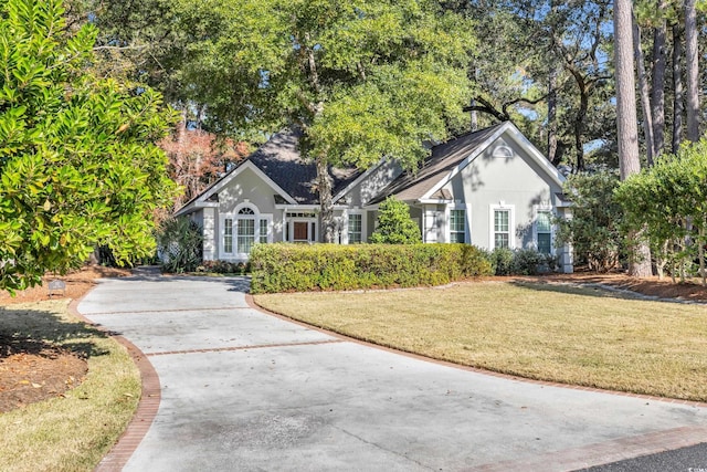 view of front of home with a front lawn