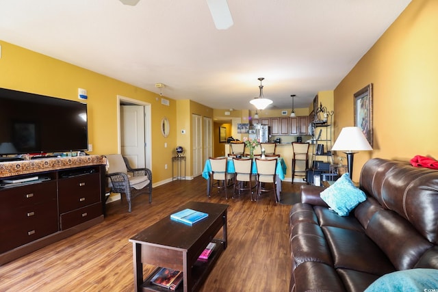 living room with light hardwood / wood-style flooring