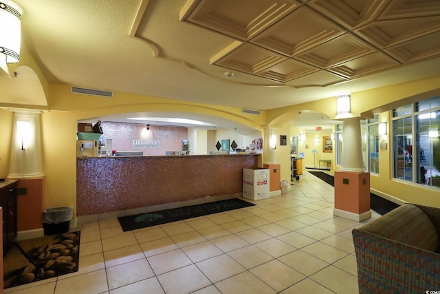 reception area featuring decorative columns