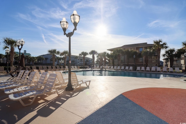 view of swimming pool featuring a patio