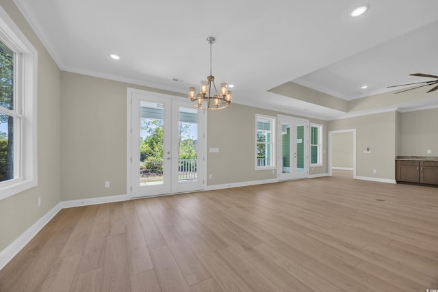 2515 Saint Andrews Dr, Little River, SC 29566 - unfurnished living room featuring crown molding, healthy amount of natural light, a chandelier, light wood finished floors, and recessed lighting