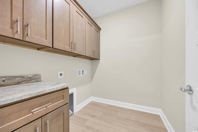 2515 Saint Andrews Dr, Little River, SC 29566 - washroom featuring hookup for an electric dryer, cabinet space, hookup for a washing machine, baseboards, and light wood finished floors