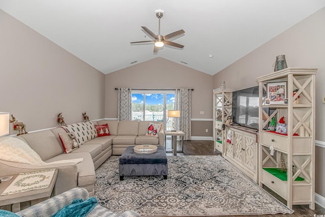 living room with hardwood / wood-style flooring, ceiling fan, and lofted ceiling