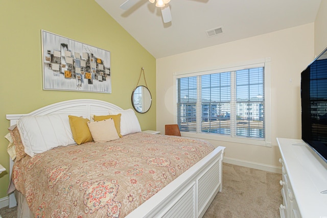 carpeted bedroom with lofted ceiling and ceiling fan