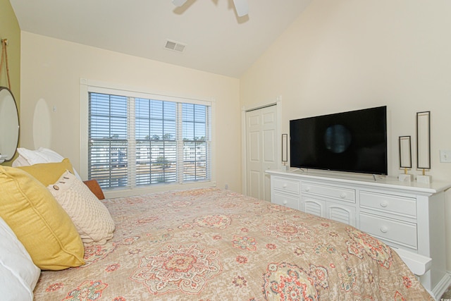 bedroom featuring ceiling fan and vaulted ceiling