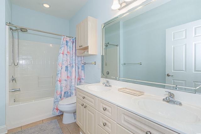 full bathroom with tile patterned flooring, vanity, shower / bath combination with curtain, and toilet