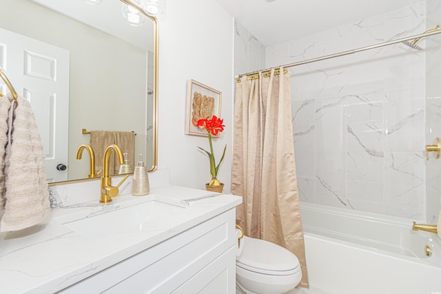 full bathroom featuring vanity, shower / bath combo, and toilet