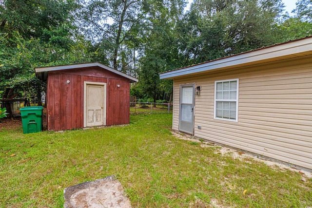 view of yard with a storage unit