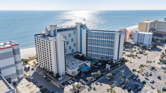 aerial view featuring a water view and a view of the beach