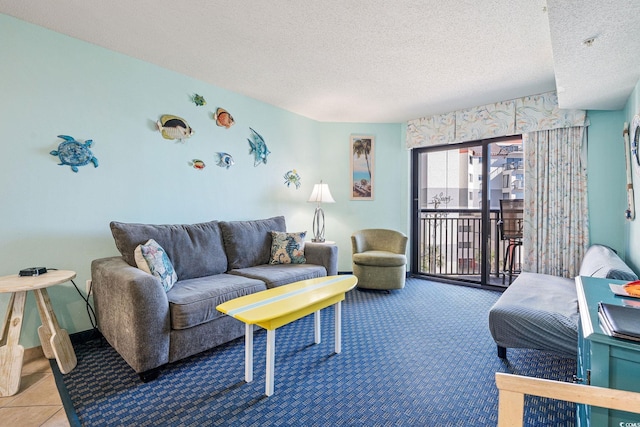 carpeted living room with a textured ceiling