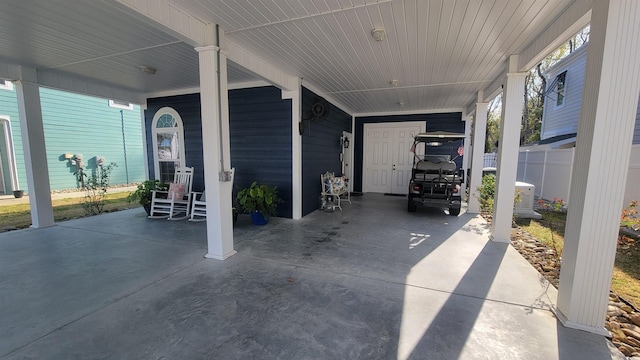 view of patio / terrace with a carport