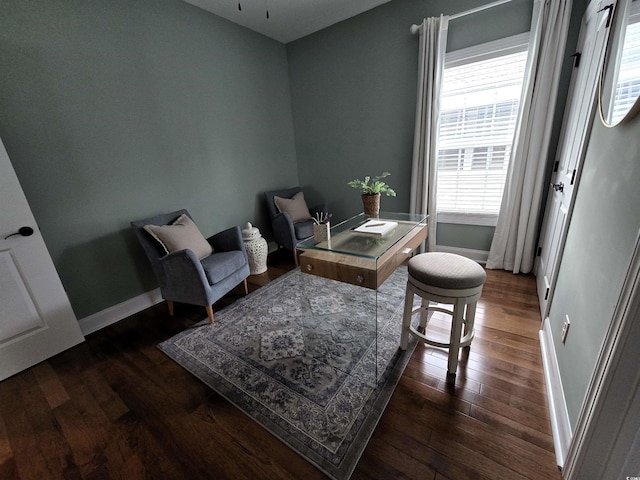 living area featuring dark hardwood / wood-style flooring