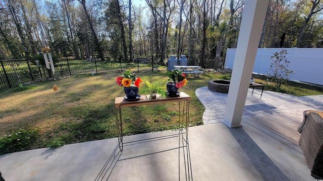 view of patio with a fire pit