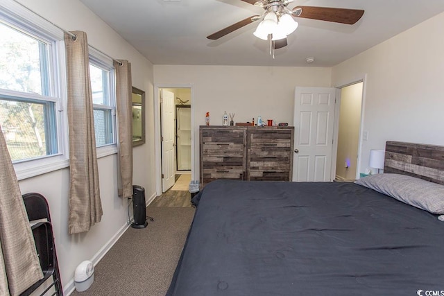 bedroom featuring carpet flooring, ceiling fan, and ensuite bathroom