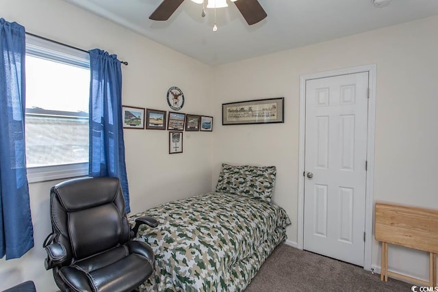 carpeted bedroom featuring ceiling fan