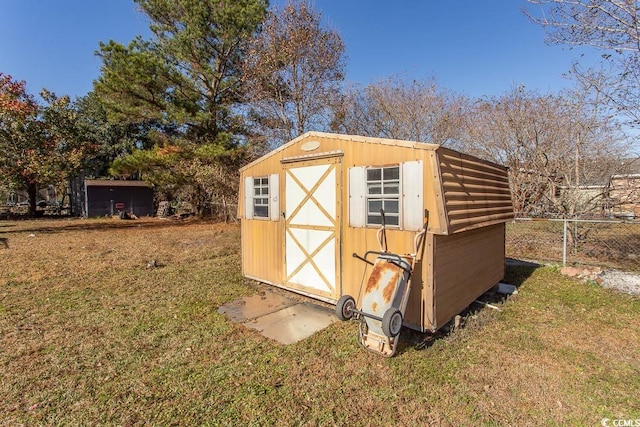 view of outdoor structure featuring a yard