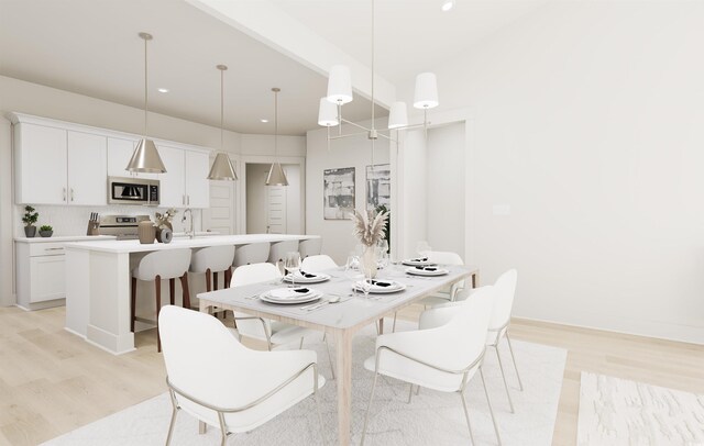 dining room featuring dark hardwood / wood-style floors, a chandelier, and high vaulted ceiling