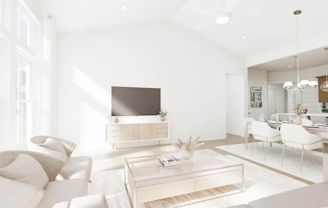 living room featuring ceiling fan with notable chandelier and high vaulted ceiling