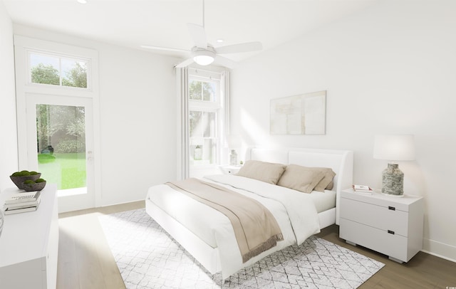 bedroom featuring wood-type flooring and ceiling fan