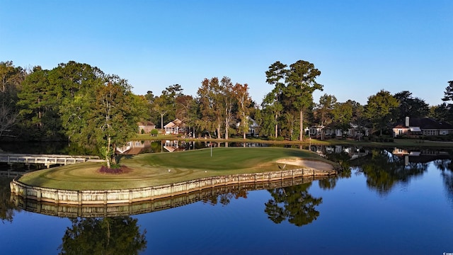 view of community with a water view