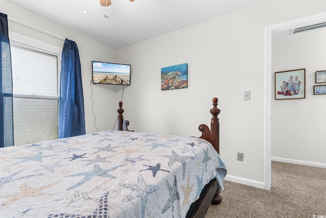 carpeted bedroom featuring ceiling fan