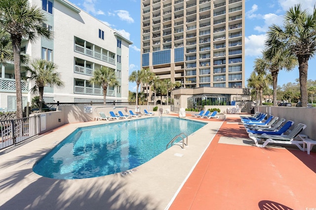 view of pool featuring a patio