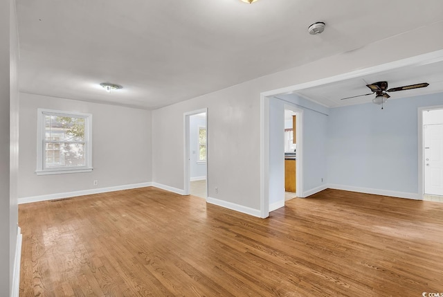 spare room with ceiling fan and light hardwood / wood-style flooring