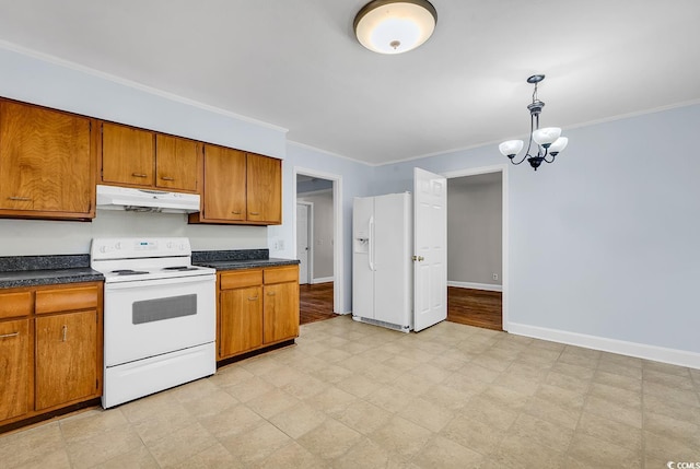 kitchen with a chandelier, pendant lighting, white appliances, and ornamental molding